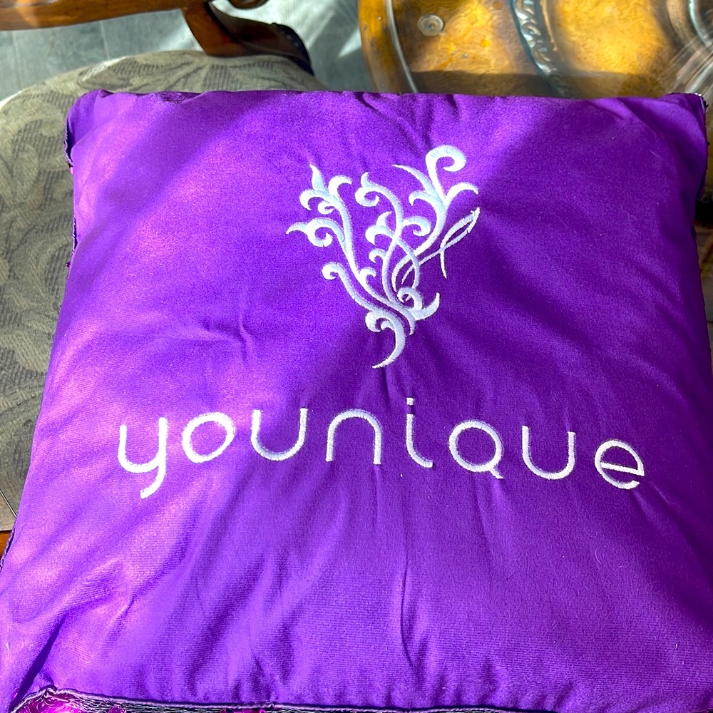 Younique branded pillow with two matching purple sequin pillows. 3 total.